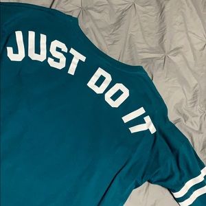 NIKE teal striped quarter sleeve top